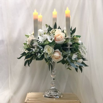 Silver candelabra with flowers
